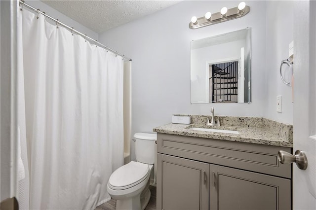 2507 Albion Farm Way, Duluth, GA 30097 - full bathroom featuring vanity, toilet, a textured ceiling, and shower / tub combo