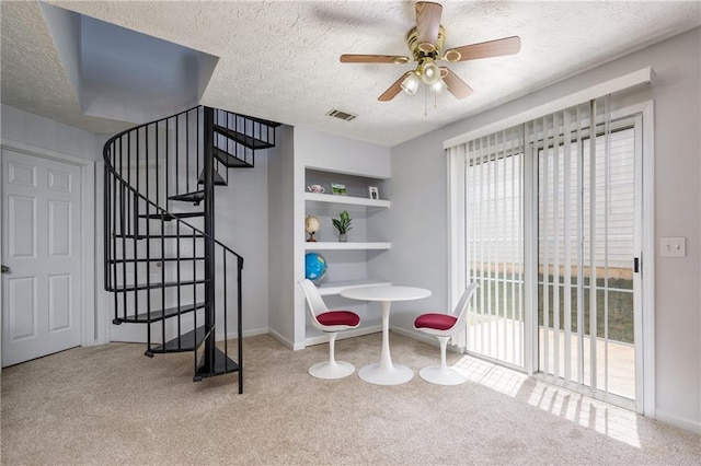 2507 Albion Farm Way, Duluth, GA 30097 - dining area featuring carpet floors, ceiling fan, a textured ceiling, stairs, and baseboards