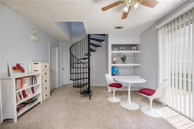 2507 Albion Farm Way, Duluth, GA 30097 - sitting room with carpet, stairway, ceiling fan, and a textured ceiling