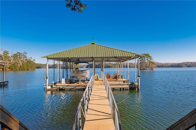 view of dock with a water view and boat lift
