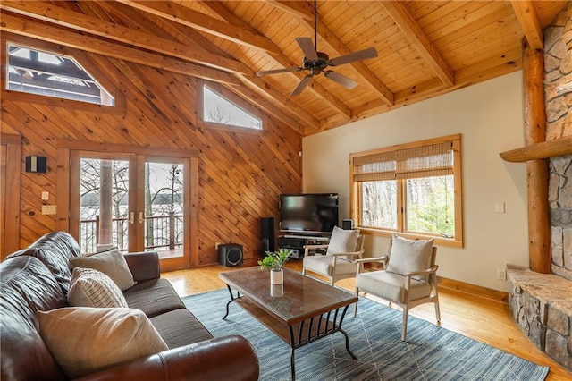 living room with french doors, wooden ceiling, high vaulted ceiling, wood finished floors, and beamed ceiling