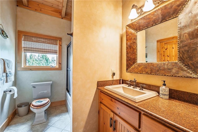 bathroom featuring toilet, enclosed tub / shower combo, beam ceiling, tile patterned floors, and vanity