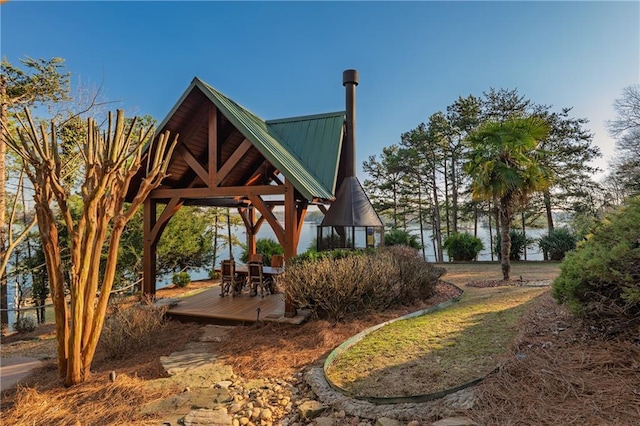 surrounding community featuring a gazebo and a deck