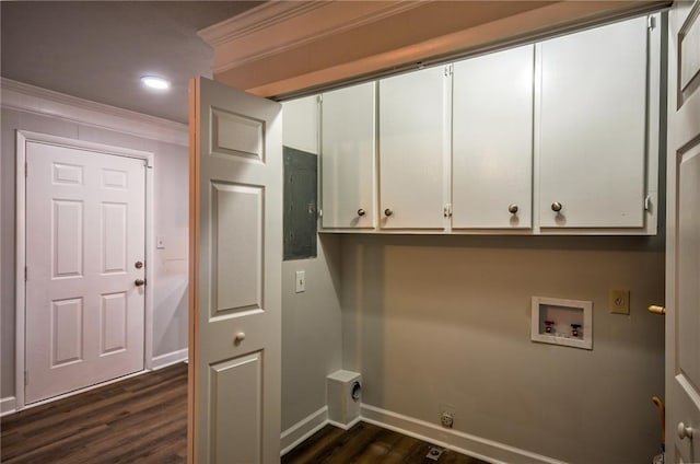washroom featuring cabinets, ornamental molding, washer hookup, and dark hardwood / wood-style flooring