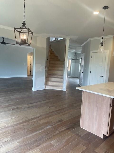 129 Silvercrest Dr, Acworth, GA 30101 - kitchen featuring open floor plan, ornamental molding, dark wood-type flooring, and baseboards
