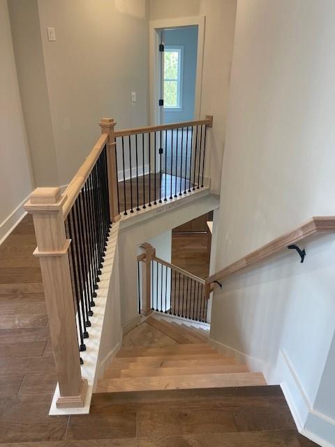 129 Silvercrest Dr, Acworth, GA 30101 - stairway featuring wood finished floors and baseboards