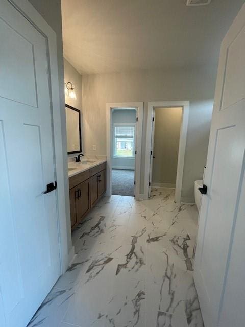 129 Silvercrest Dr, Acworth, GA 30101 - bathroom featuring vanity and marble look tiles