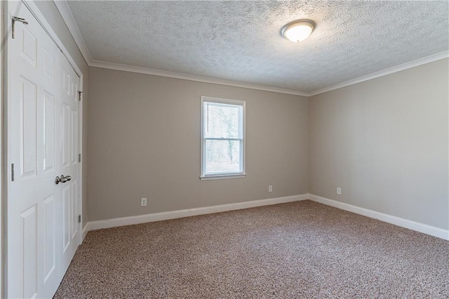 unfurnished bedroom with crown molding, a closet, carpet, and a textured ceiling