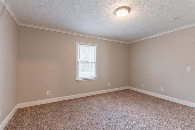 unfurnished room with ornamental molding, carpet floors, and a textured ceiling