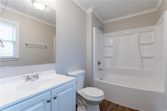 full bathroom with toilet, bathing tub / shower combination, wood-type flooring, a textured ceiling, and vanity