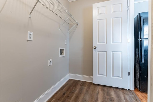 clothes washing area featuring hookup for a washing machine, hookup for an electric dryer, and dark hardwood / wood-style flooring