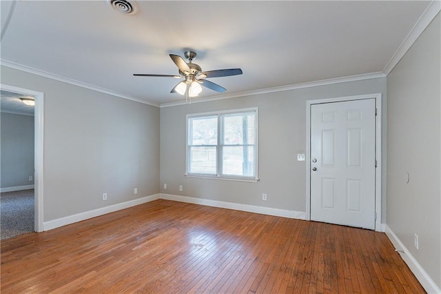 interior space featuring hardwood / wood-style flooring, crown molding, and ceiling fan