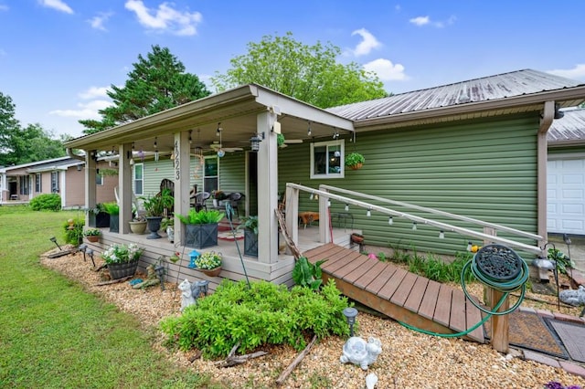 4223 Spring Valley Dr, Cohutta, GA 30710 - view of front of house with a ceiling fan, metal roof, and a front yard