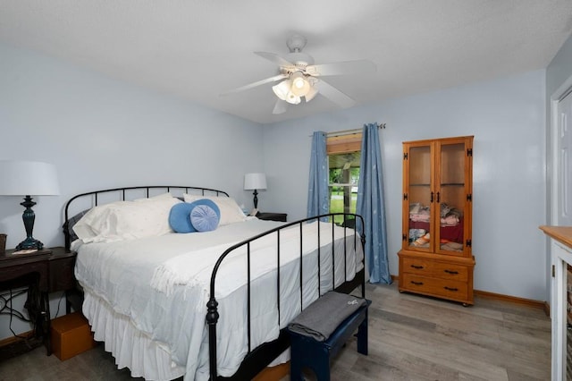 4223 Spring Valley Dr, Cohutta, GA 30710 - bedroom with wood finished floors, ceiling fan, and baseboards