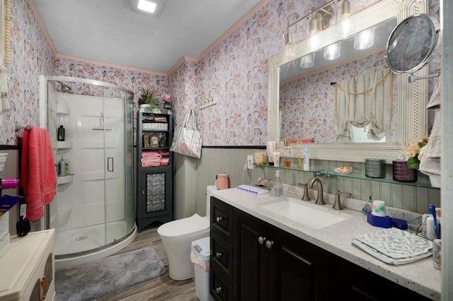 4223 Spring Valley Dr, Cohutta, GA 30710 - full bath featuring wallpapered walls, wainscoting, a stall shower, vanity, and wood finished floors