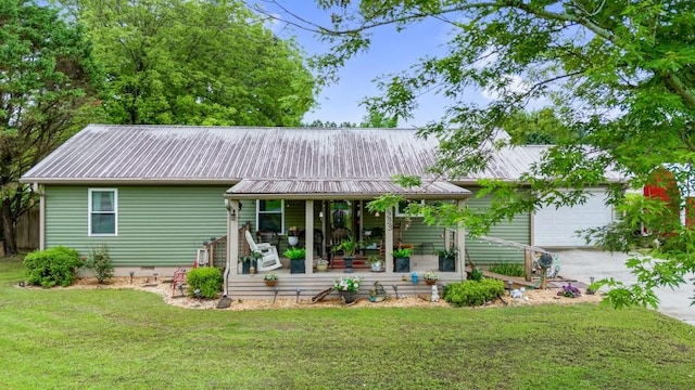 4223 Spring Valley Dr, Cohutta, GA 30710 - rear view of property featuring covered porch, a lawn, concrete driveway, metal roof, and a garage