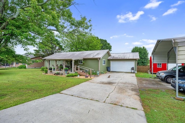 4223 Spring Valley Dr, Cohutta, GA 30710 - view of front of house with a front yard, metal roof, driveway, covered porch, and a detached garage