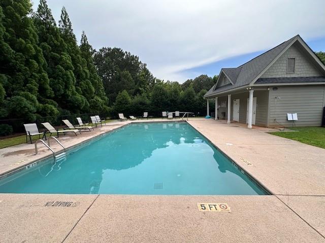 view of pool with a patio area