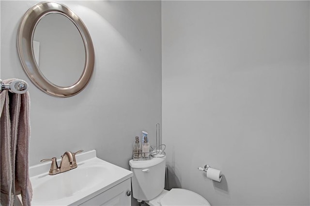 half bath with toilet and vanity