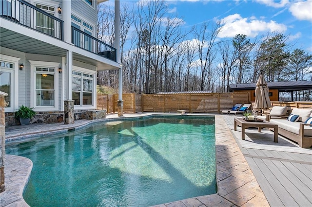 view of pool with fence and a fenced in pool