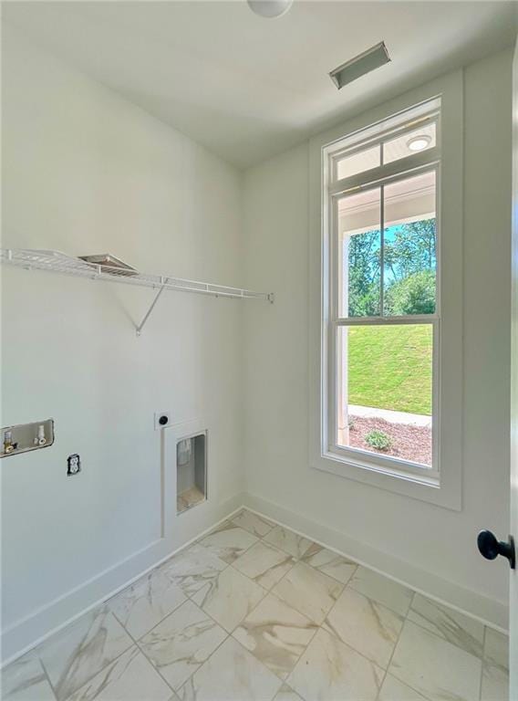 laundry room featuring hookup for an electric dryer and hookup for a washing machine