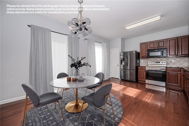 kitchen featuring pendant lighting, a notable chandelier, backsplash, appliances with stainless steel finishes, and dark hardwood / wood-style flooring