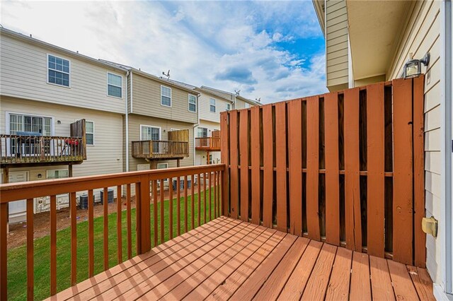 deck featuring a yard