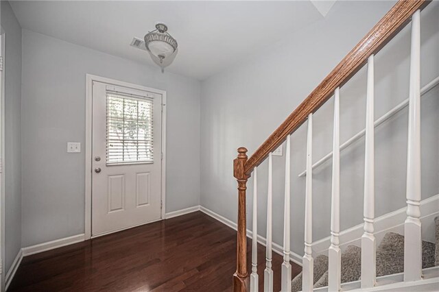 entrance foyer with dark hardwood / wood-style flooring