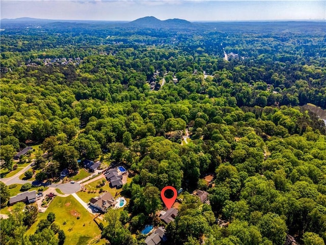 bird's eye view with a view of trees