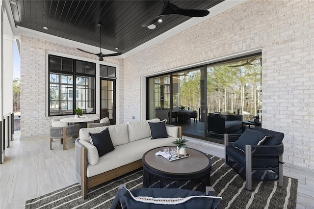 view of patio / terrace featuring ceiling fan and outdoor lounge area