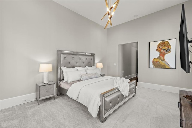 carpeted bedroom featuring lofted ceiling and a notable chandelier