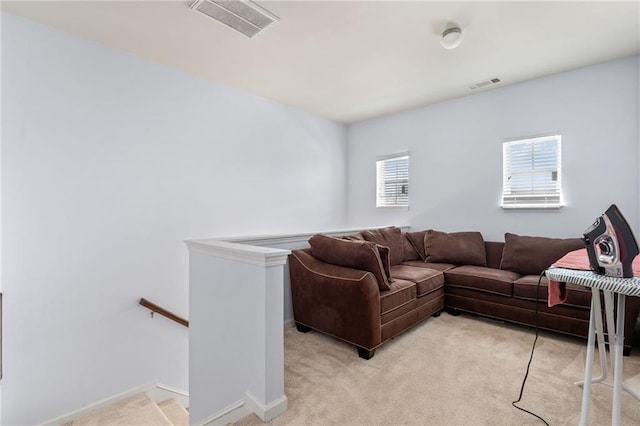 1612 Nations Trl, Riverdale, GA 30296 - living room with light colored carpet, baseboards, and visible vents