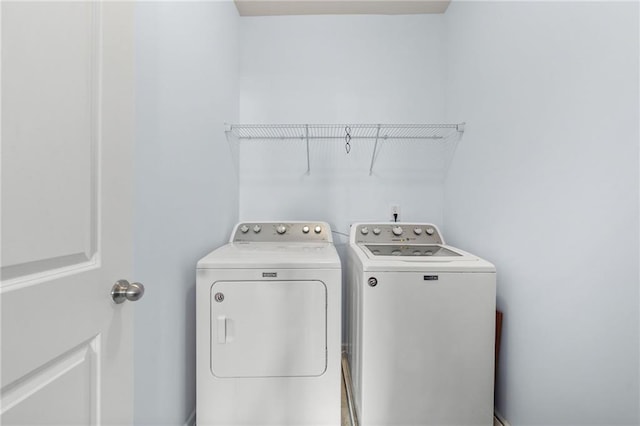 1612 Nations Trl, Riverdale, GA 30296 - clothes washing area with laundry area and washer and clothes dryer