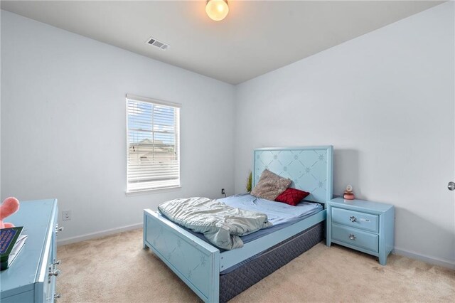 1612 Nations Trl, Riverdale, GA 30296 - bedroom featuring visible vents, baseboards, and light carpet