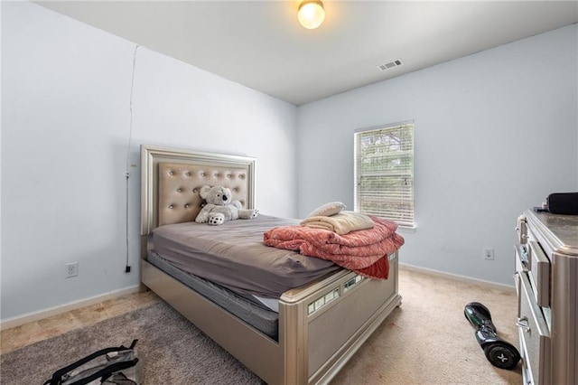 1612 Nations Trl, Riverdale, GA 30296 - bedroom with visible vents, baseboards, and light carpet