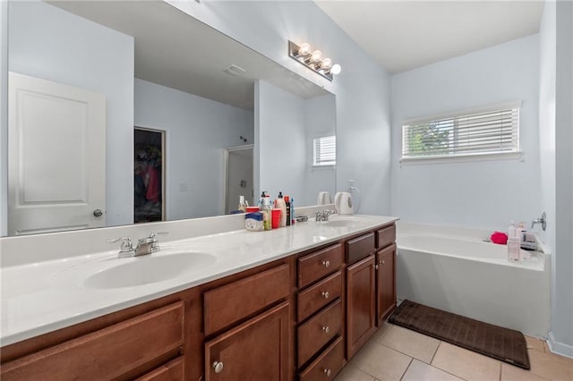 1612 Nations Trl, Riverdale, GA 30296 - bathroom featuring a sink, double vanity, a stall shower, and a bath