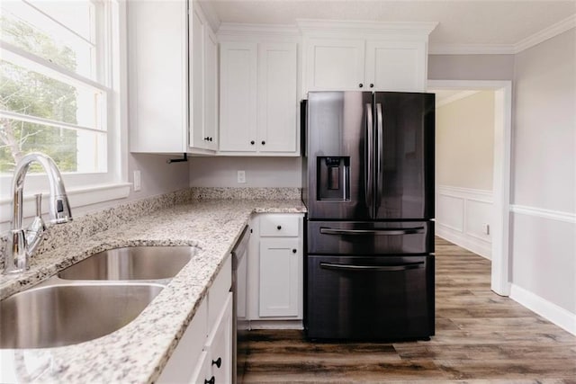 1233 Bethlehem Rd, Statham, GA 30666 - kitchen featuring refrigerator with ice dispenser, a sink, dark wood-type flooring, plenty of natural light, and ornamental molding