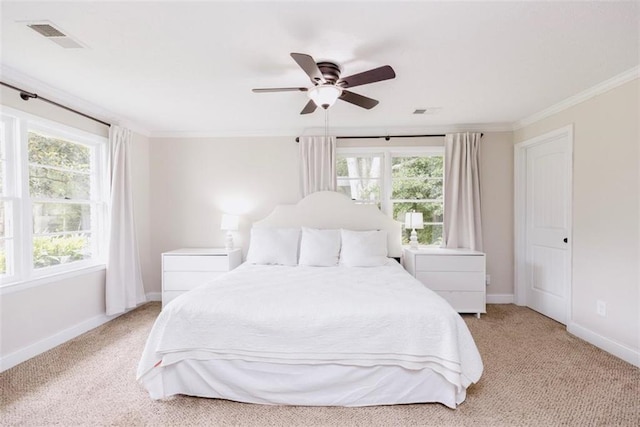 1233 Bethlehem Rd, Statham, GA 30666 - bedroom with crown molding, baseboards, light colored carpet, and ceiling fan