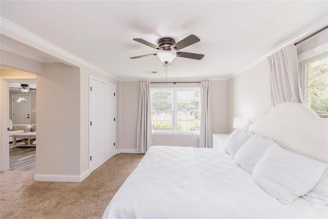1233 Bethlehem Rd, Statham, GA 30666 - bedroom with baseboards, carpet, crown molding, and a ceiling fan