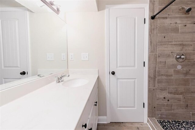 1233 Bethlehem Rd, Statham, GA 30666 - bathroom featuring a tile shower and vanity