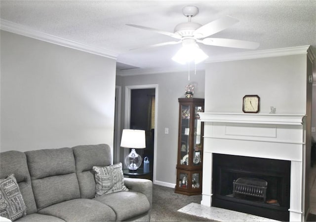 carpeted living area with a fireplace, ornamental molding, and ceiling fan