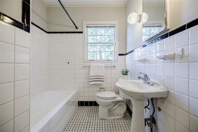 2007 Mount Vernon Pl, Dunwoody, GA 30338 - bathroom with tile walls, ornamental molding, and wainscoting