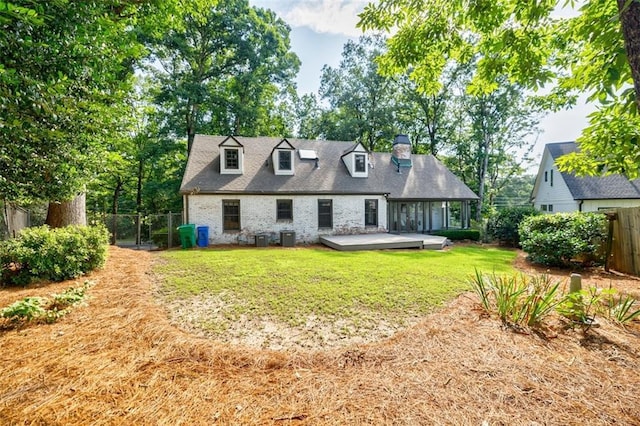 2007 Mount Vernon Pl, Dunwoody, GA 30338 - rear view of house with a fenced backyard, a chimney, a wooden deck, and brick siding