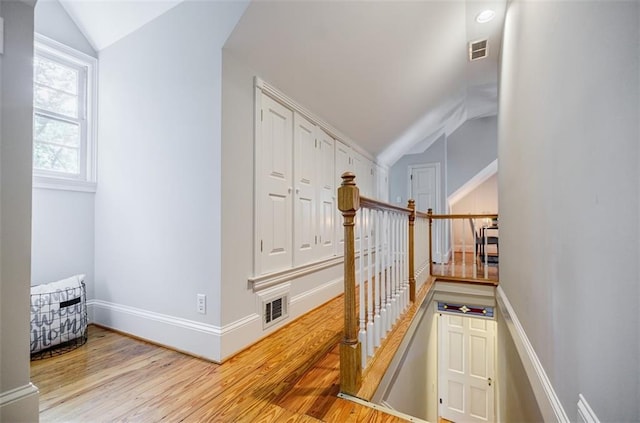 2007 Mount Vernon Pl, Dunwoody, GA 30338 - staircase featuring lofted ceiling and wood finished floors