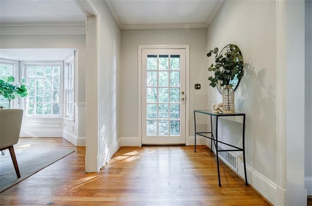 2007 Mount Vernon Pl, Dunwoody, GA 30338 - entryway featuring light wood-style floors, plenty of natural light, and crown molding