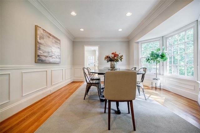 2007 Mount Vernon Pl, Dunwoody, GA 30338 - dining room featuring light wood-style flooring, a decorative wall, wainscoting, recessed lighting, and crown molding