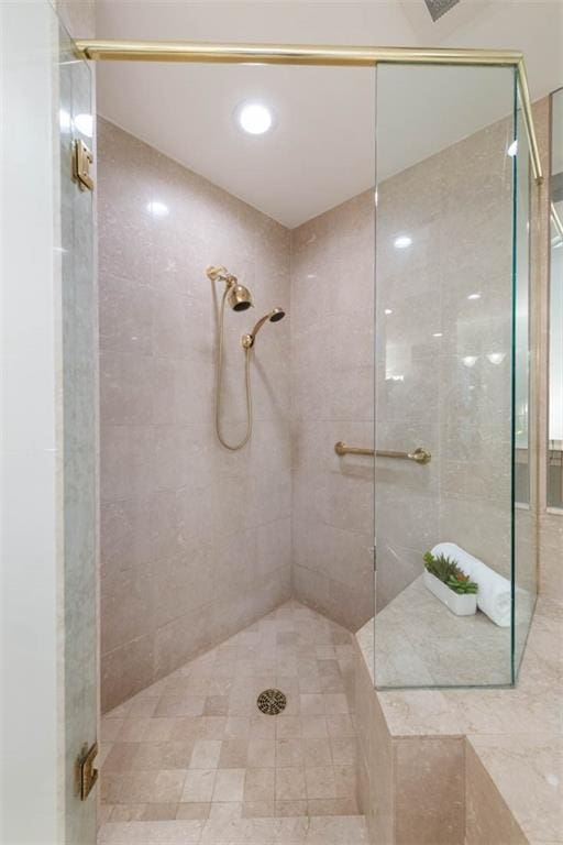 bathroom featuring an enclosed shower