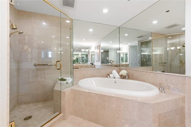 bathroom featuring separate shower and tub and tile patterned flooring