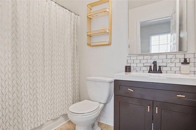 bathroom featuring curtained shower, toilet, vanity, and decorative backsplash