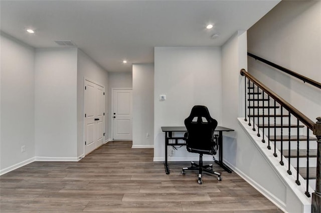 office with hardwood / wood-style flooring